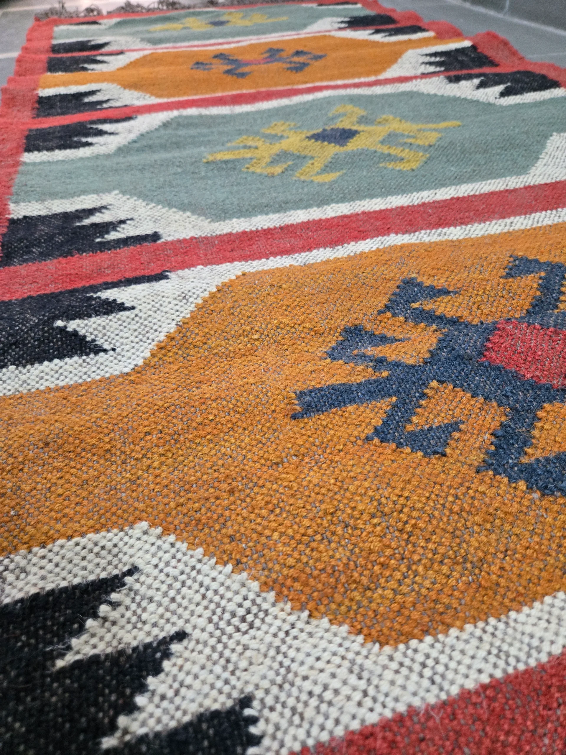 Bold geometric tribal area rug