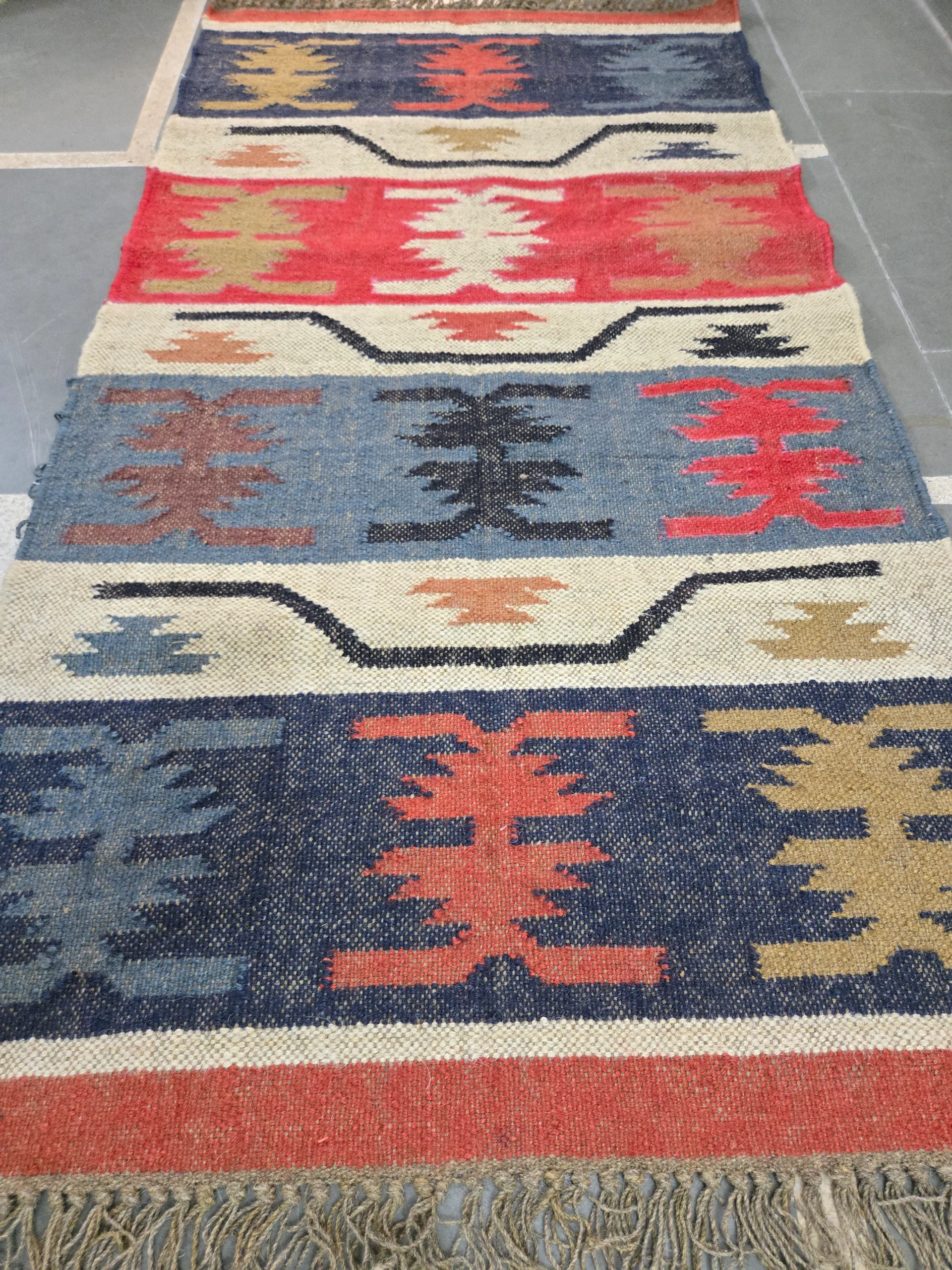 Bold tribal rug totem pattern