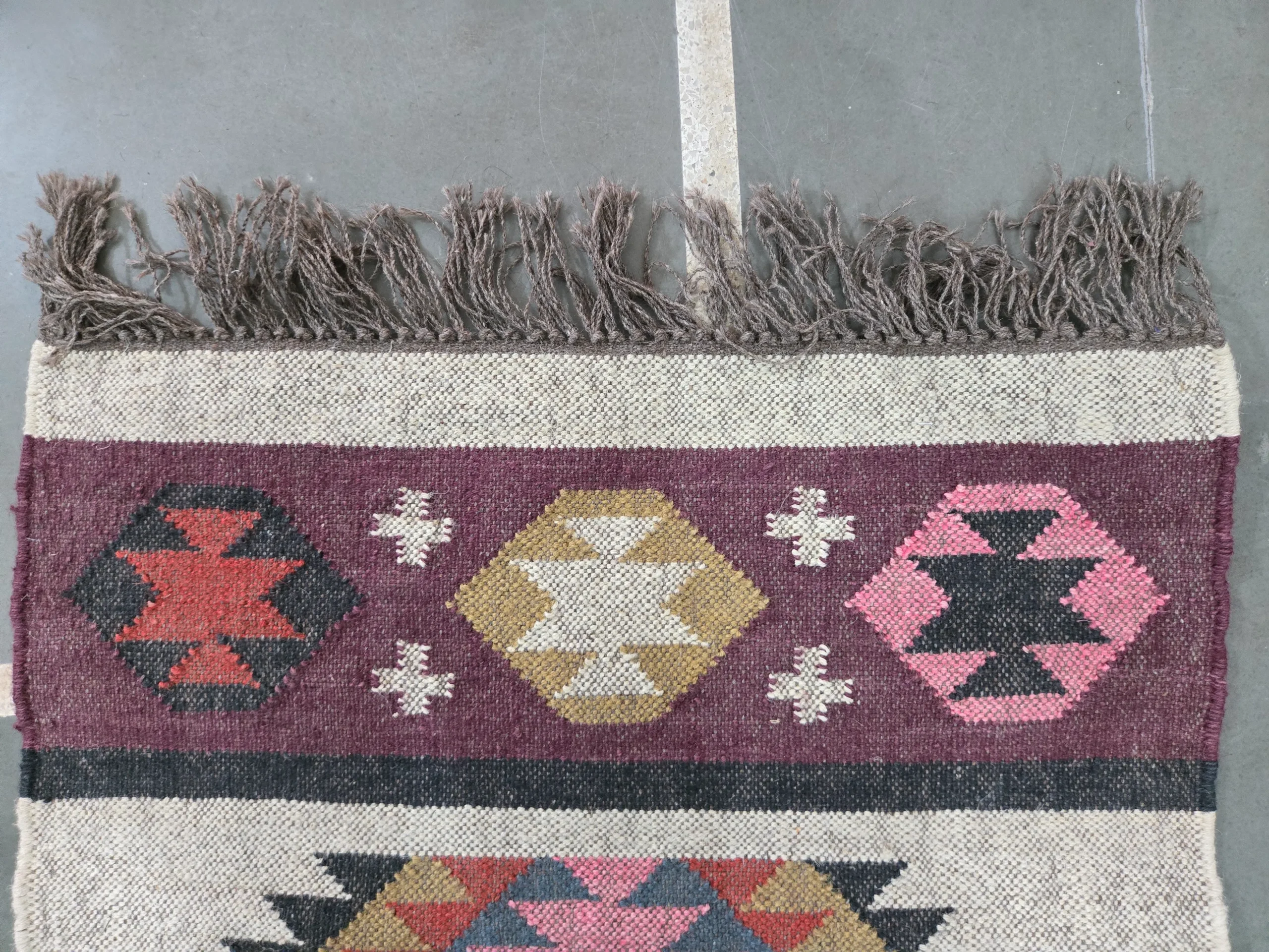 Colorful tribal diamond rug pattern