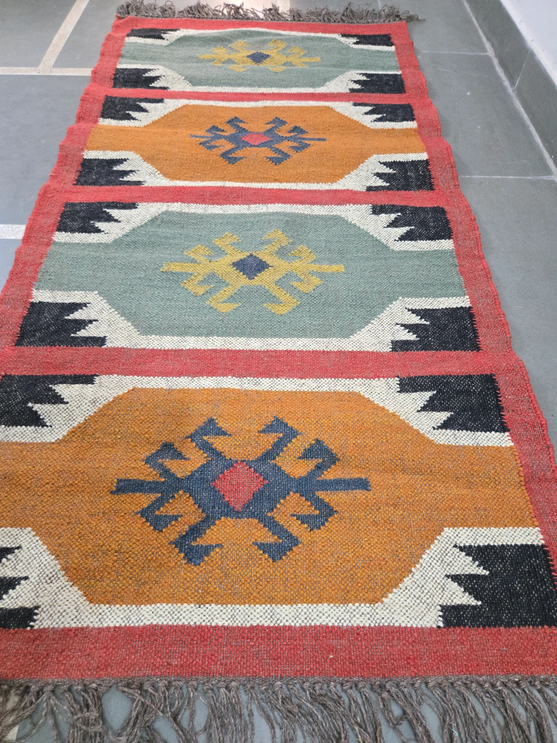 Geometric folk design tribal rug