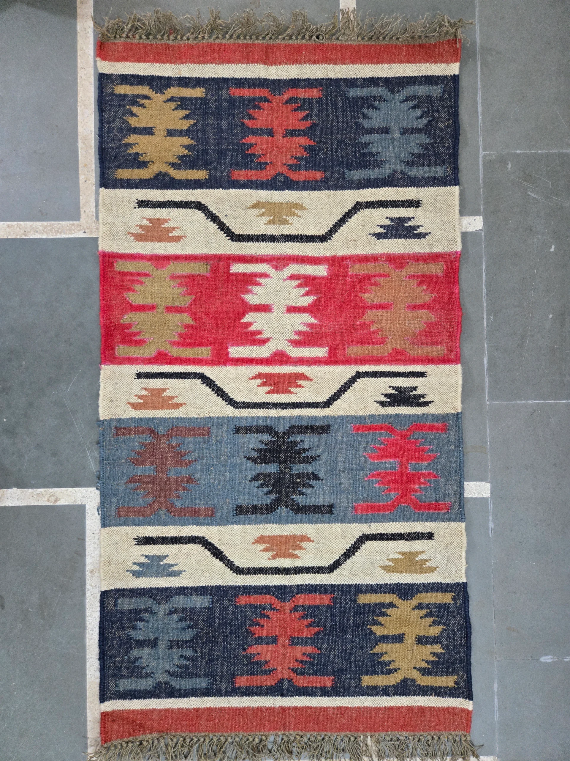 Navy red ivory tribal rug